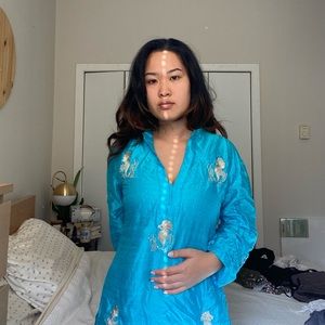 CJ Laing blue top beautifully embroidered . Size M. In great condition